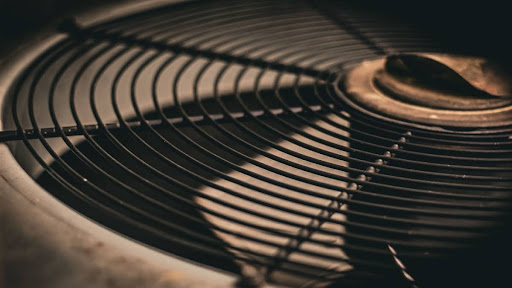 The top of an outdoor AC unit.